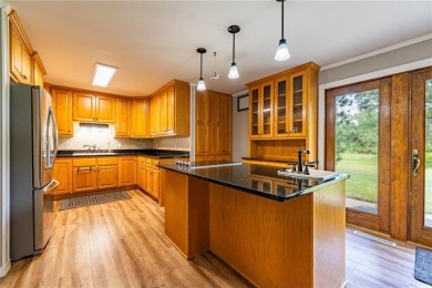 Enjoy the expansive back yard from your patio. Situated next to on Breezy Point Golf Course Resort in Minnesota - for sale on GolfHomes.com, golf home, golf lot