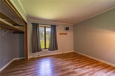 Enjoy the expansive back yard from your patio. Situated next to on Breezy Point Golf Course Resort in Minnesota - for sale on GolfHomes.com, golf home, golf lot
