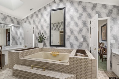 A true masterpiece in the Country Club Estates! This is a rare on Mount Pleasant Country Club in Texas - for sale on GolfHomes.com, golf home, golf lot