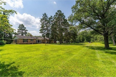 Enjoy the expansive back yard from your patio. Situated next to on Breezy Point Golf Course Resort in Minnesota - for sale on GolfHomes.com, golf home, golf lot