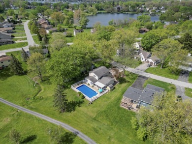 Beautiful MOVE-IN-READY home on the Golf Course With FANTASTIC on Lakes of the Four Seasons Country Club in Indiana - for sale on GolfHomes.com, golf home, golf lot