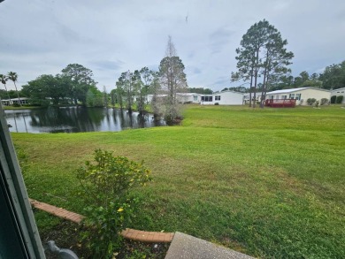 This home is on leased land and is located in Cypress Lakes, a on Big Cypress Golf and Country Club in Florida - for sale on GolfHomes.com, golf home, golf lot