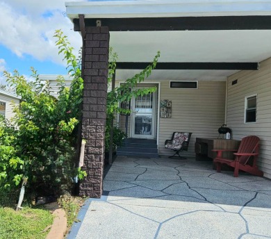 This home is on leased land and is located in Cypress Lakes, a on Big Cypress Golf and Country Club in Florida - for sale on GolfHomes.com, golf home, golf lot