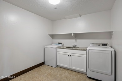 Nestled inside the highly desired gated community of Red Ledges on Red Ledges Golf Club in Utah - for sale on GolfHomes.com, golf home, golf lot