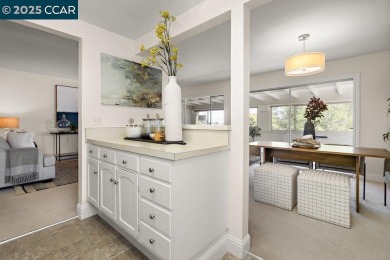 This bright and cheerful Sequoia Wrap end-unit is like a tree on Rossmoor Golf Course in California - for sale on GolfHomes.com, golf home, golf lot