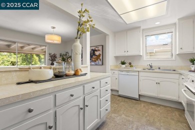 This bright and cheerful Sequoia Wrap end-unit is like a tree on Rossmoor Golf Course in California - for sale on GolfHomes.com, golf home, golf lot