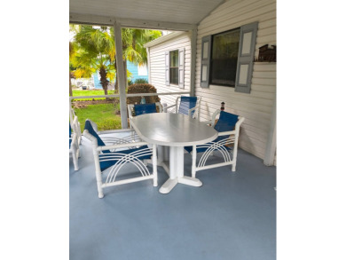 This lovely, manufactured home on leased land in a gated and age on Pine Lakes Country Club in Florida - for sale on GolfHomes.com, golf home, golf lot