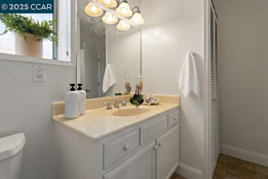 This bright and cheerful Sequoia Wrap end-unit is like a tree on Rossmoor Golf Course in California - for sale on GolfHomes.com, golf home, golf lot