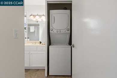 This bright and cheerful Sequoia Wrap end-unit is like a tree on Rossmoor Golf Course in California - for sale on GolfHomes.com, golf home, golf lot
