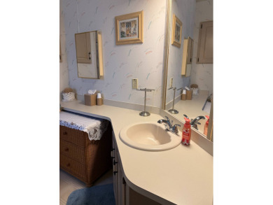 This lovely, manufactured home on leased land in a gated and age on Pine Lakes Country Club in Florida - for sale on GolfHomes.com, golf home, golf lot