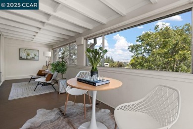 This bright and cheerful Sequoia Wrap end-unit is like a tree on Rossmoor Golf Course in California - for sale on GolfHomes.com, golf home, golf lot