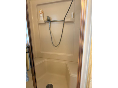 This lovely, manufactured home on leased land in a gated and age on Pine Lakes Country Club in Florida - for sale on GolfHomes.com, golf home, golf lot
