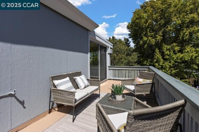 This bright and cheerful Sequoia Wrap end-unit is like a tree on Rossmoor Golf Course in California - for sale on GolfHomes.com, golf home, golf lot
