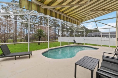 Welcome Home to your Florida Paradise! This is a beautiful 5 bed on Highlands Reserve Golf Club in Florida - for sale on GolfHomes.com, golf home, golf lot