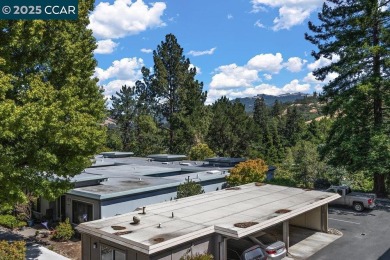 This bright and cheerful Sequoia Wrap end-unit is like a tree on Rossmoor Golf Course in California - for sale on GolfHomes.com, golf home, golf lot