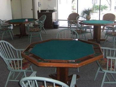 This lovely, manufactured furnished home on leased land in a on Pine Lakes Country Club in Florida - for sale on GolfHomes.com, golf home, golf lot