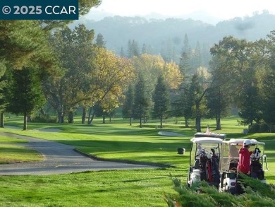 This bright and cheerful Sequoia Wrap end-unit is like a tree on Rossmoor Golf Course in California - for sale on GolfHomes.com, golf home, golf lot