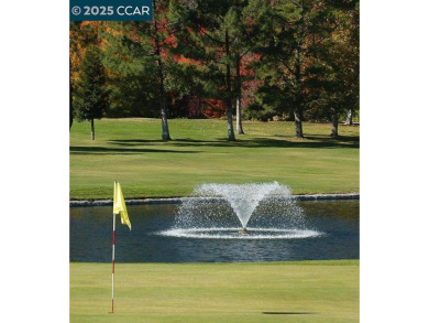 This bright and cheerful Sequoia Wrap end-unit is like a tree on Rossmoor Golf Course in California - for sale on GolfHomes.com, golf home, golf lot