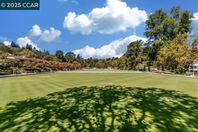 This bright and cheerful Sequoia Wrap end-unit is like a tree on Rossmoor Golf Course in California - for sale on GolfHomes.com, golf home, golf lot