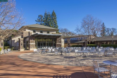 This bright and cheerful Sequoia Wrap end-unit is like a tree on Rossmoor Golf Course in California - for sale on GolfHomes.com, golf home, golf lot