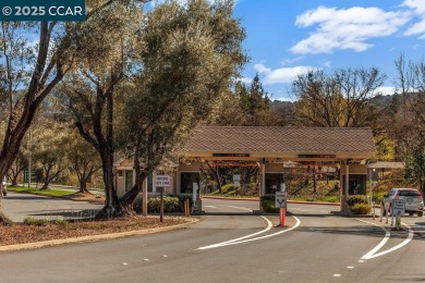 This bright and cheerful Sequoia Wrap end-unit is like a tree on Rossmoor Golf Course in California - for sale on GolfHomes.com, golf home, golf lot