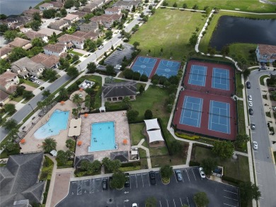 Absolutely Stunning Townhome in a Top-Rated School District - on Eagle Creek Golf Club in Florida - for sale on GolfHomes.com, golf home, golf lot
