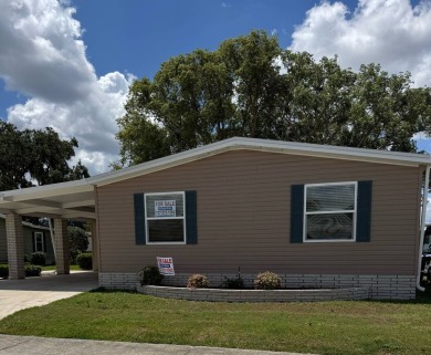 453 Don Tab Way on Golden Lakes Golf Course in Florida - for sale on GolfHomes.com, golf home, golf lot