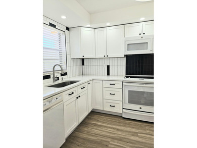 Welcome to this beautifully renovated 2-bedroom, 2-bathroom on  in Florida - for sale on GolfHomes.com, golf home, golf lot