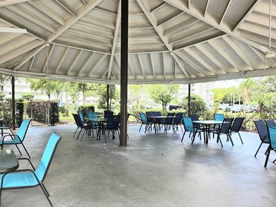 Welcome to this beautifully renovated 2-bedroom, 2-bathroom on  in Florida - for sale on GolfHomes.com, golf home, golf lot