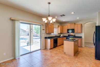 This spacious home, nestled on a tranquil cul-de-sac lot, offers on Estrella Mountain Ranch Golf Course in Arizona - for sale on GolfHomes.com, golf home, golf lot