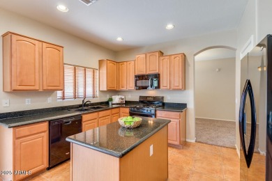 This spacious home, nestled on a tranquil cul-de-sac lot, offers on Estrella Mountain Ranch Golf Course in Arizona - for sale on GolfHomes.com, golf home, golf lot