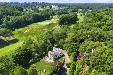 Picturesque Stanwich Colonial with golf course views, located on Greenwich Country Club in Connecticut - for sale on GolfHomes.com, golf home, golf lot