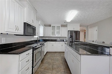 Welcome to 30 Silver Leaf Loop, a pristine, FRESHLY PAINTED on Lakewood Golf Course in Alabama - for sale on GolfHomes.com, golf home, golf lot