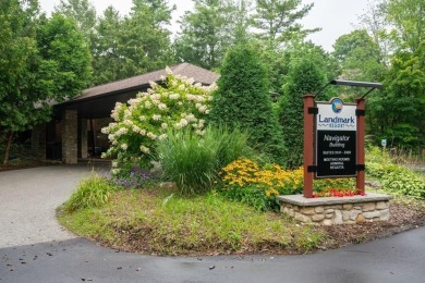 The Woodview unit boasts a prime spot right by the Navigator on Alpine Resort and Golf Course in Wisconsin - for sale on GolfHomes.com, golf home, golf lot