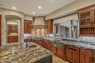 Quality, design, location...this gorgeous estate in prestigious on  in Nevada - for sale on GolfHomes.com, golf home, golf lot