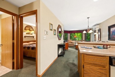 The Woodview unit boasts a prime spot right by the Navigator on Alpine Resort and Golf Course in Wisconsin - for sale on GolfHomes.com, golf home, golf lot