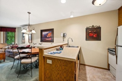 The Woodview unit boasts a prime spot right by the Navigator on Alpine Resort and Golf Course in Wisconsin - for sale on GolfHomes.com, golf home, golf lot