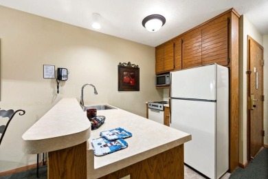 The Woodview unit boasts a prime spot right by the Navigator on Alpine Resort and Golf Course in Wisconsin - for sale on GolfHomes.com, golf home, golf lot