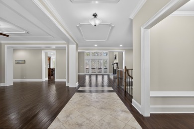 Impeccably maintained, this stunning home offers sweeping views on Reynolds Lake Oconee - The Oconee in Georgia - for sale on GolfHomes.com, golf home, golf lot