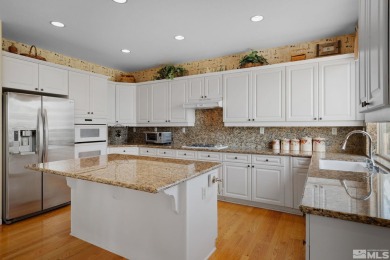 A single story home in the Sundance neighborhood of Arrowcreek on ArrowCreek Golf Club - The Challenge in Nevada - for sale on GolfHomes.com, golf home, golf lot