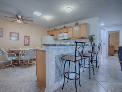 BOND PAID!  ROOF 2023! HVAC 2024!  WELL MAINTAINED COLONY PATIO on The Links of Spruce Creek in Florida - for sale on GolfHomes.com, golf home, golf lot