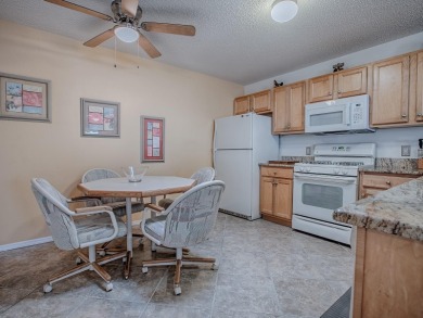 BOND PAID!  ROOF 2023! HVAC 2024!  WELL MAINTAINED COLONY PATIO on The Links of Spruce Creek in Florida - for sale on GolfHomes.com, golf home, golf lot