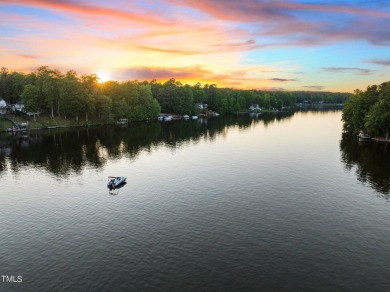 Discover the perfect blend of elegance, functionality, and on River Golf and County Club at Lake Royale in North Carolina - for sale on GolfHomes.com, golf home, golf lot