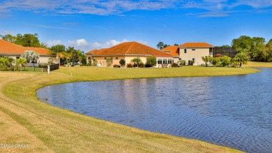 Nestled in gated Portofino Reserve of Venetian Bay, this custom on Venetian Bay Golf Course in Florida - for sale on GolfHomes.com, golf home, golf lot
