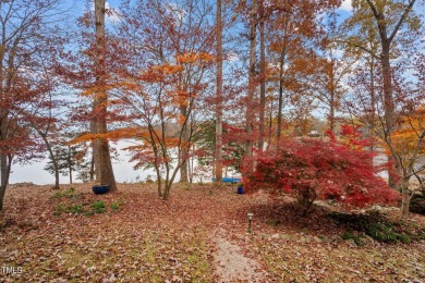 Discover the perfect blend of elegance, functionality, and on River Golf and County Club at Lake Royale in North Carolina - for sale on GolfHomes.com, golf home, golf lot