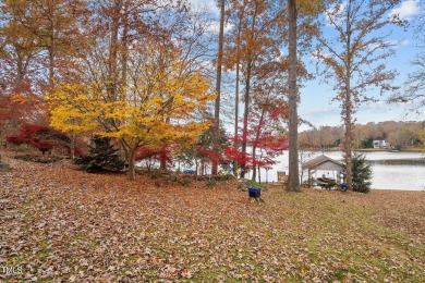 Discover the perfect blend of elegance, functionality, and on River Golf and County Club at Lake Royale in North Carolina - for sale on GolfHomes.com, golf home, golf lot