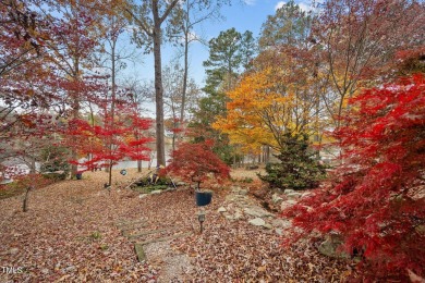 Discover the perfect blend of elegance, functionality, and on River Golf and County Club at Lake Royale in North Carolina - for sale on GolfHomes.com, golf home, golf lot