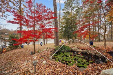 Discover the perfect blend of elegance, functionality, and on River Golf and County Club at Lake Royale in North Carolina - for sale on GolfHomes.com, golf home, golf lot