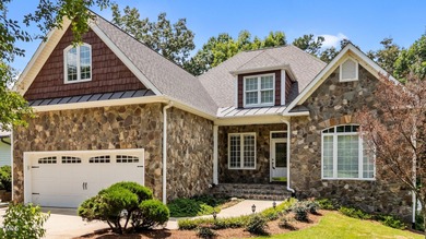 Discover the perfect blend of elegance, functionality, and on River Golf and County Club at Lake Royale in North Carolina - for sale on GolfHomes.com, golf home, golf lot