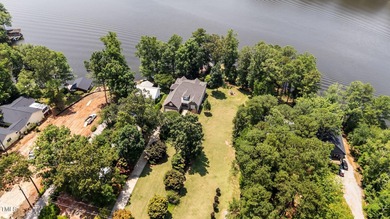 Discover the perfect blend of elegance, functionality, and on River Golf and County Club at Lake Royale in North Carolina - for sale on GolfHomes.com, golf home, golf lot